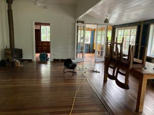 fans inside house drying after the flood